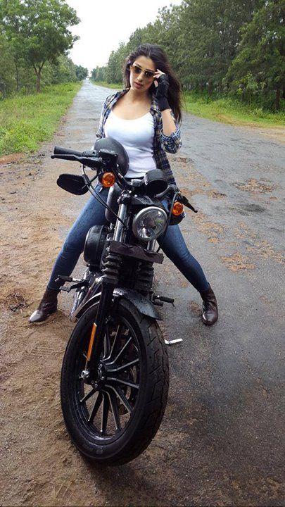 Raai Laxmi Riding Bike Images