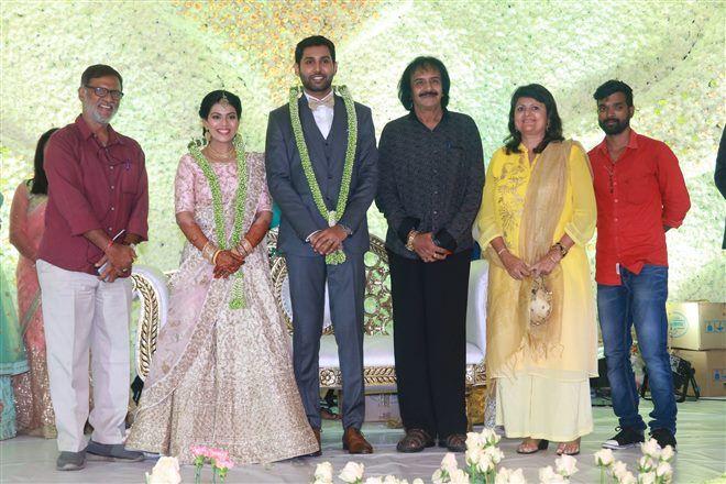 Aadhav Weds Vinodhnie Reception Photos