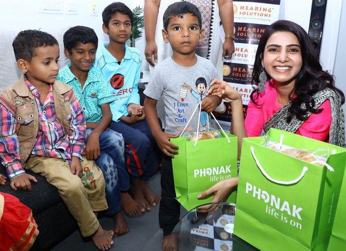Samantha at an event for hearing-impaired kids