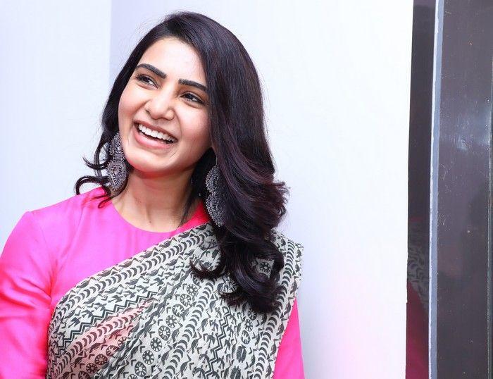 Samantha at an event for hearing-impaired kids