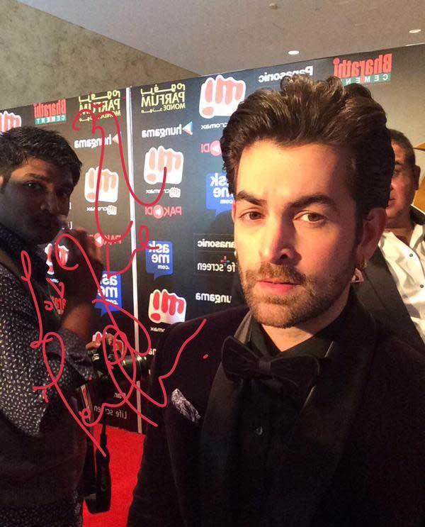 Celebs Signature Stills At SIIMA Awards 2015