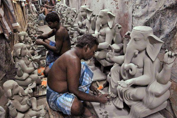 Ganesh Idol making from Clay soil Photos
