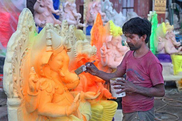 Ganesh Idol making from Clay soil Photos