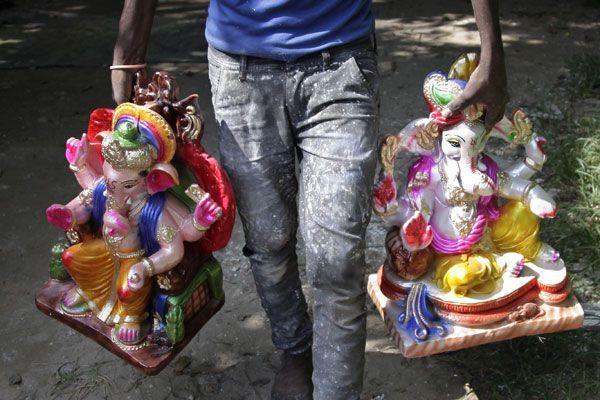 Ganesh Idol making from Clay soil Photos