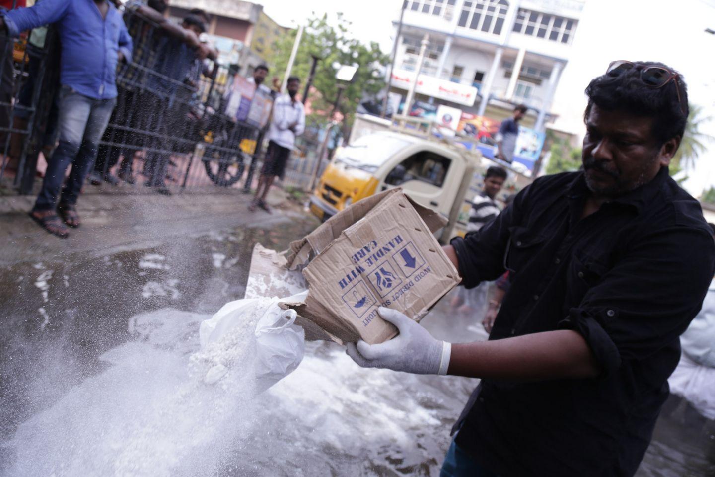 Actor Parthiban doing Flood Relief Activities