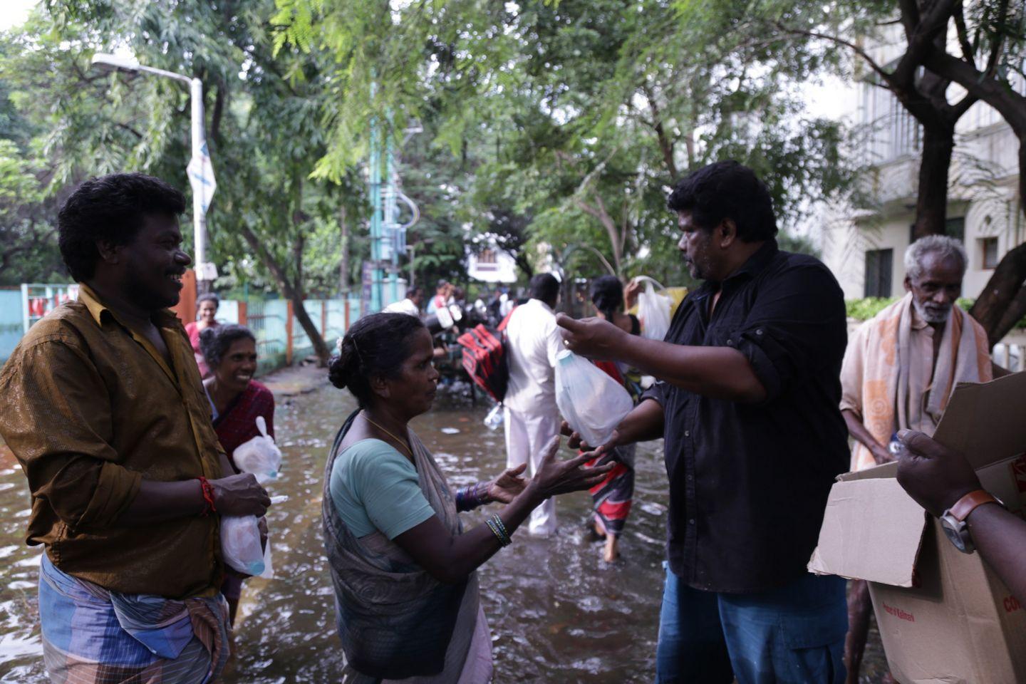 Actor Parthiban doing Flood Relief Activities