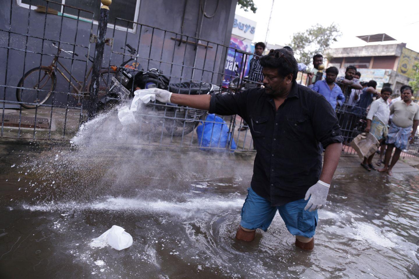 Actor Parthiban doing Flood Relief Activities