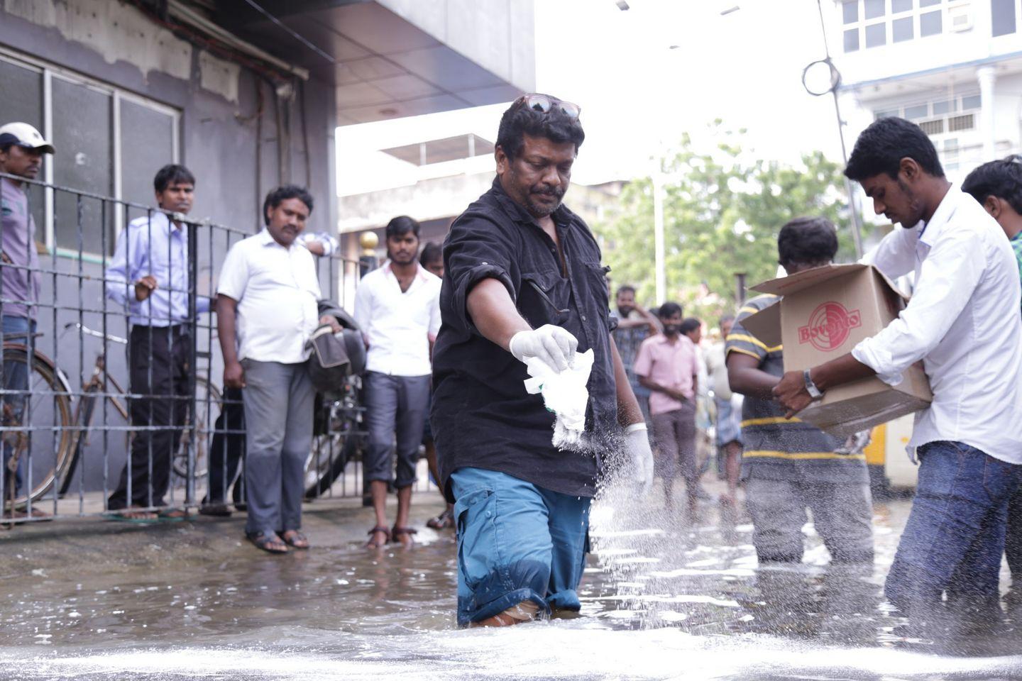 Actor Parthiban doing Flood Relief Activities