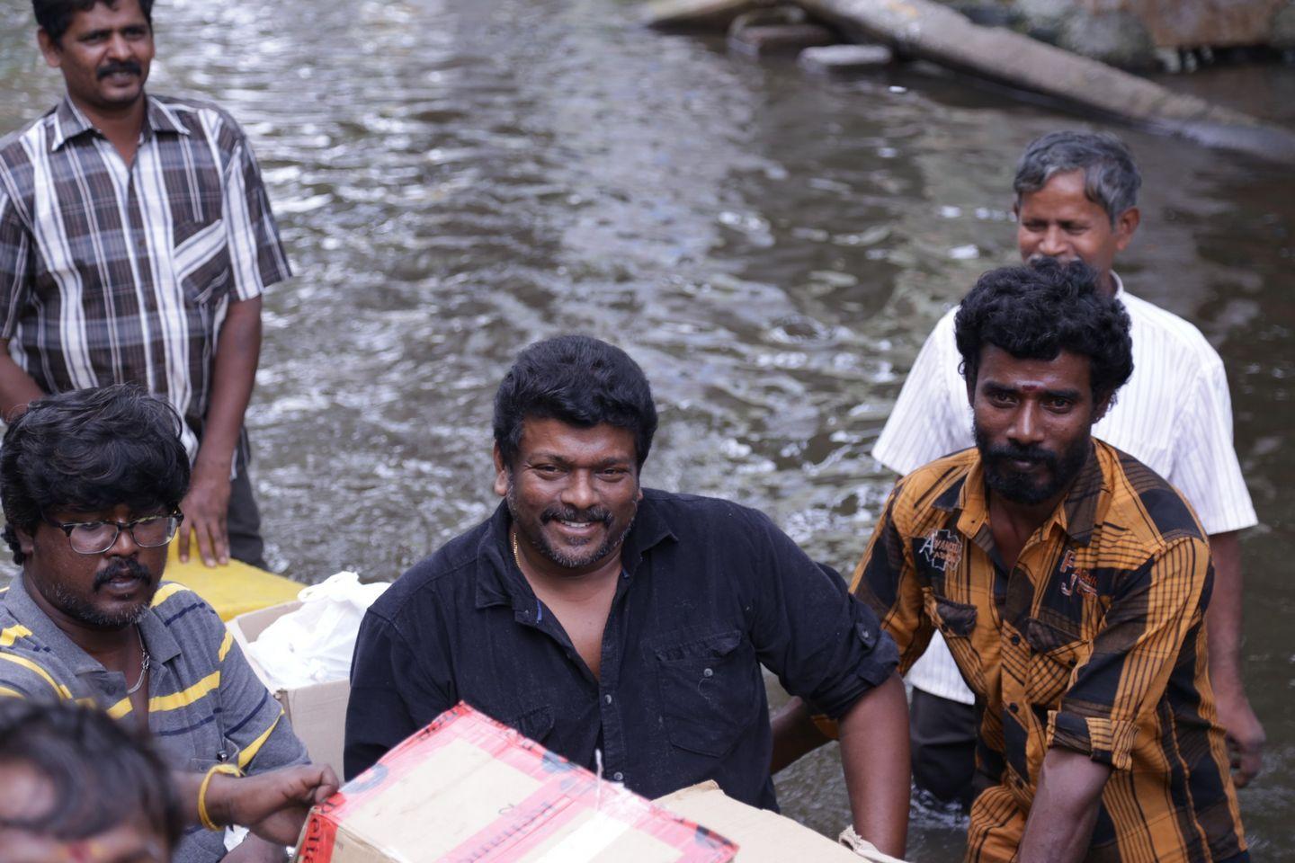 Actor Parthiban doing Flood Relief Activities