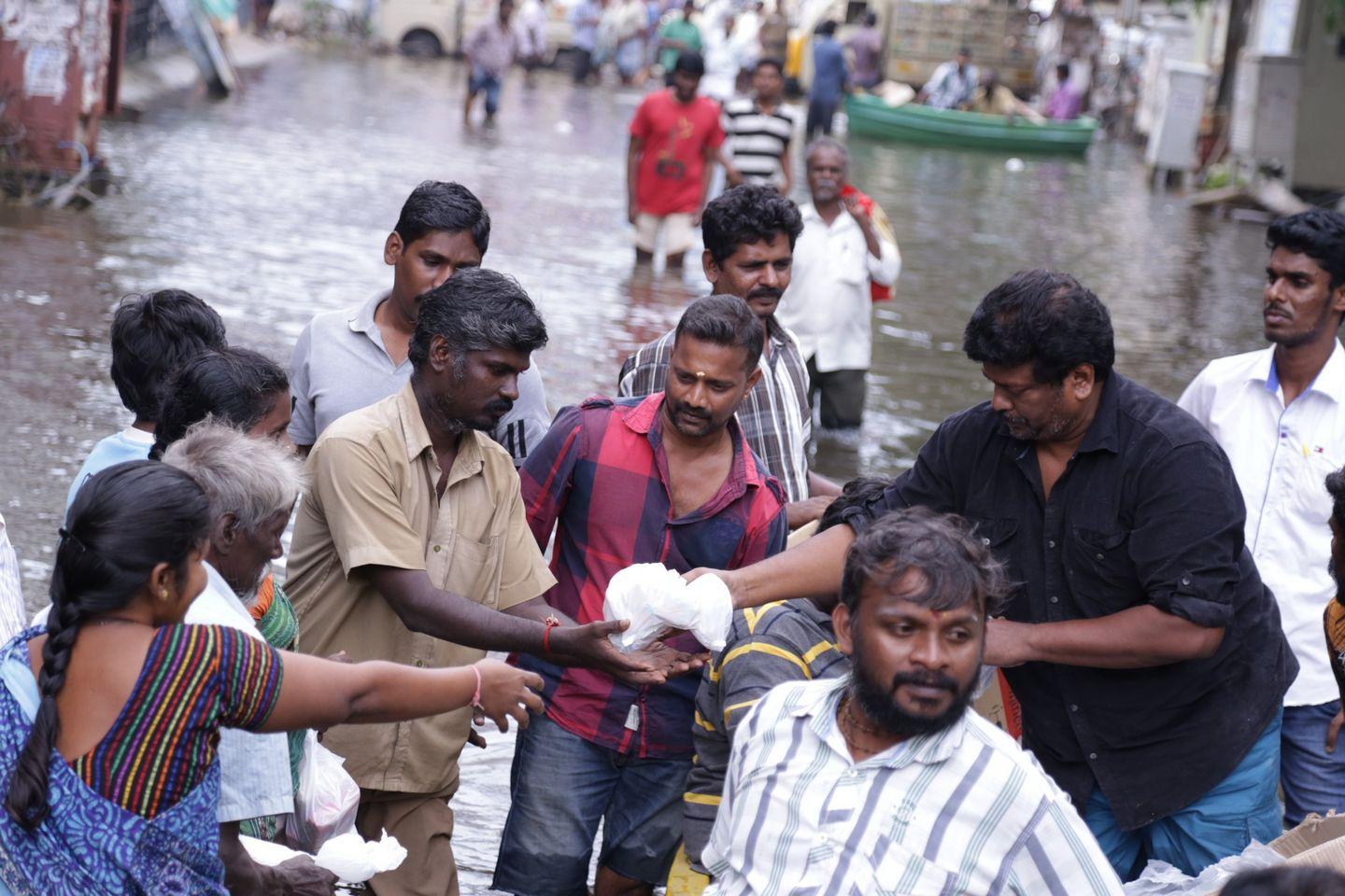 Actor Parthiban doing Flood Relief Activities