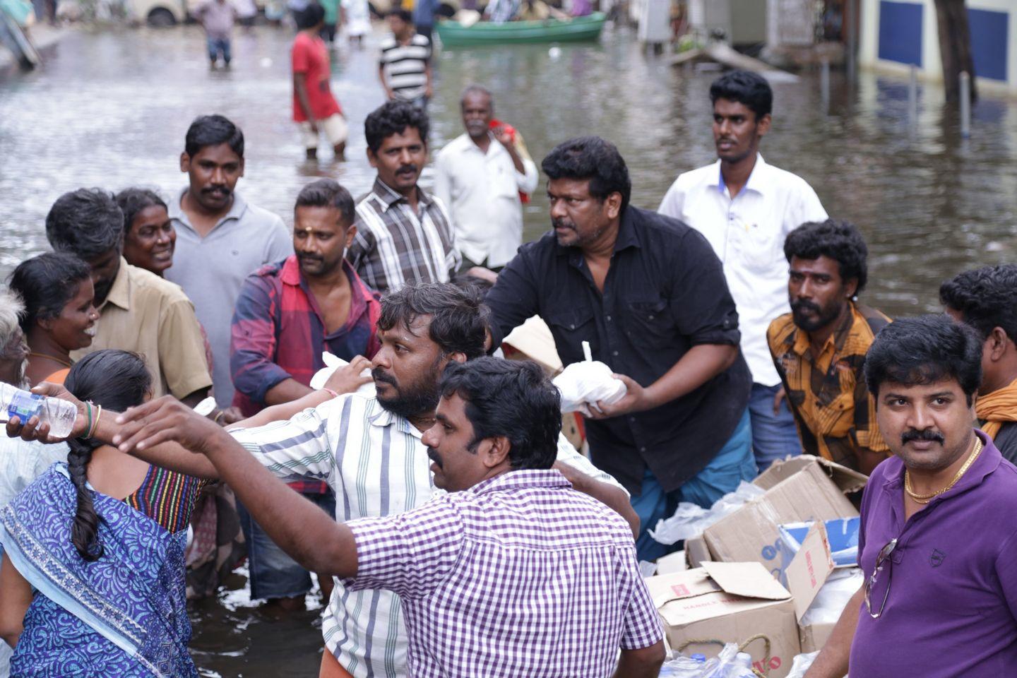 Actor Parthiban doing Flood Relief Activities