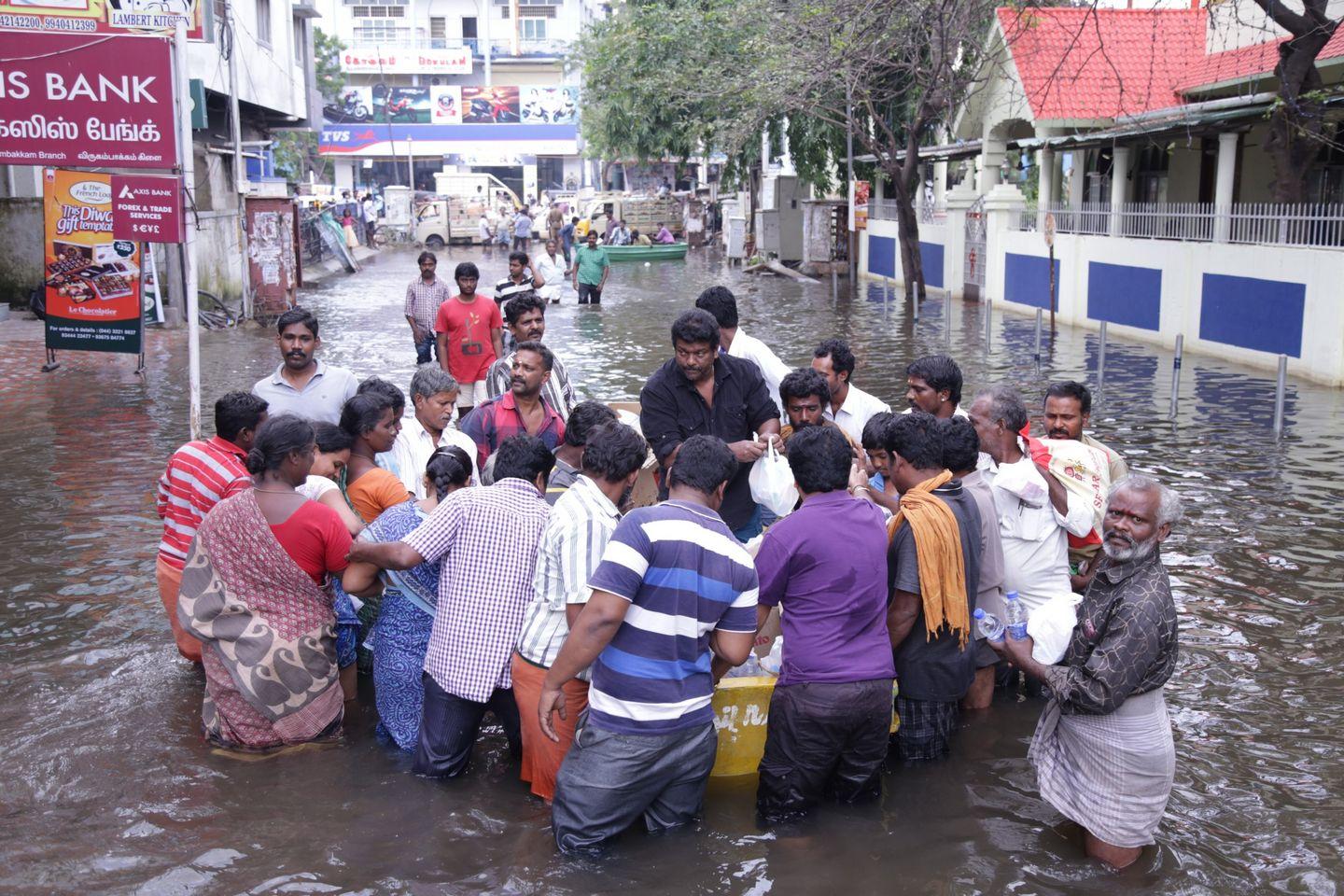 Actor Parthiban doing Flood Relief Activities