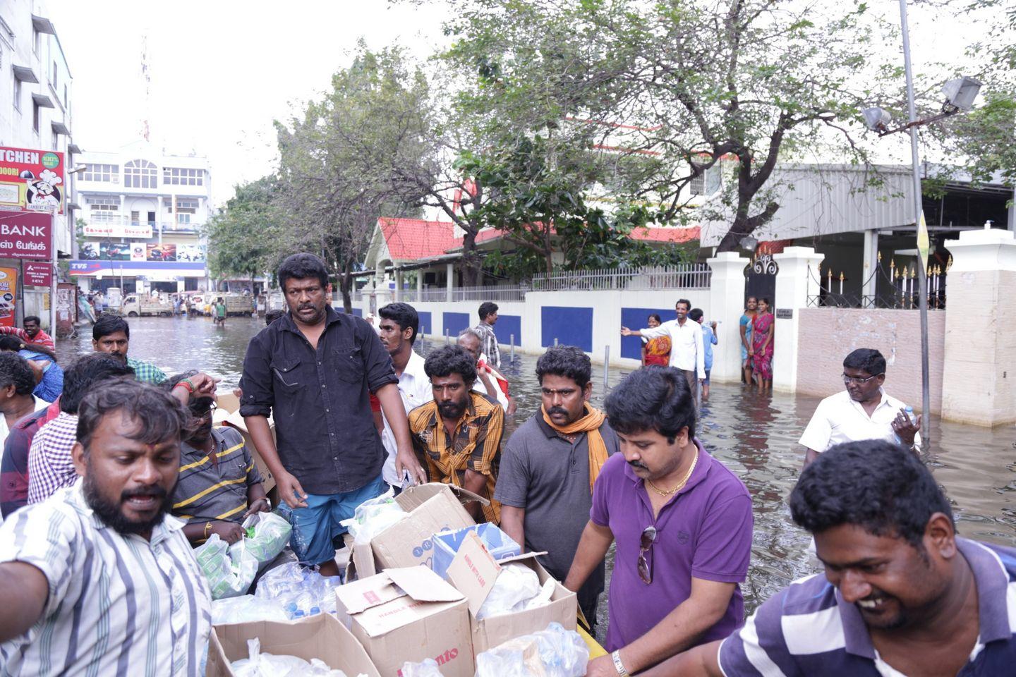 Actor Parthiban doing Flood Relief Activities