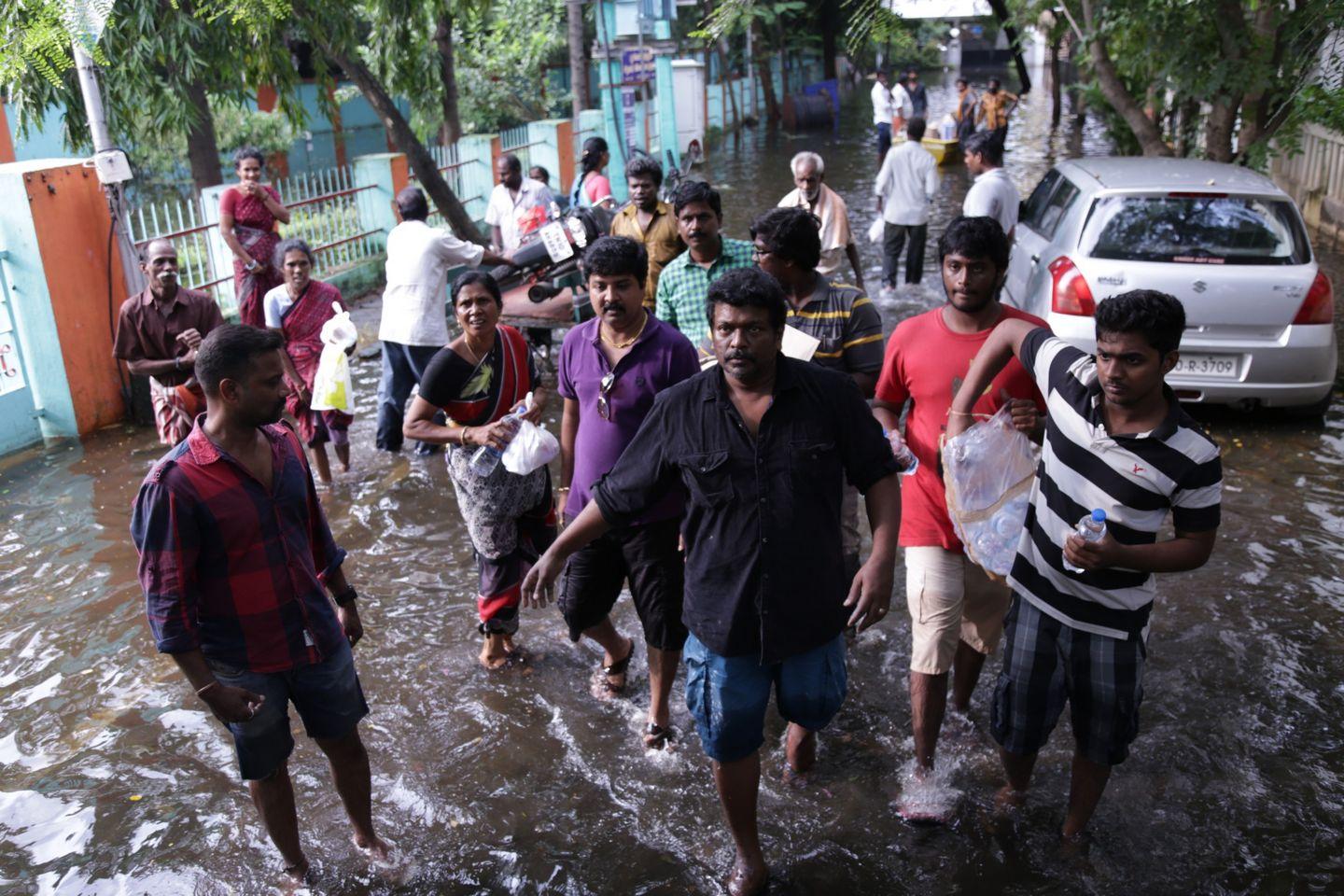 Actor Parthiban doing Flood Relief Activities