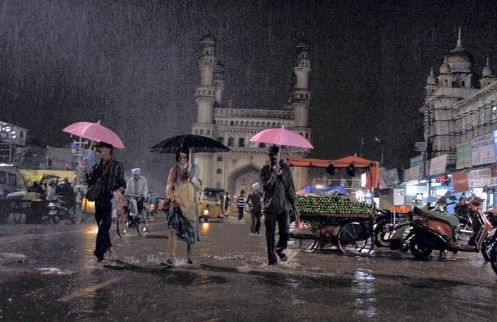 Heavy rains lash Telangana Photos