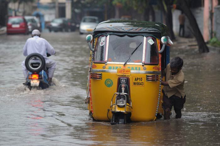 Heavy rains lash Telangana Photos