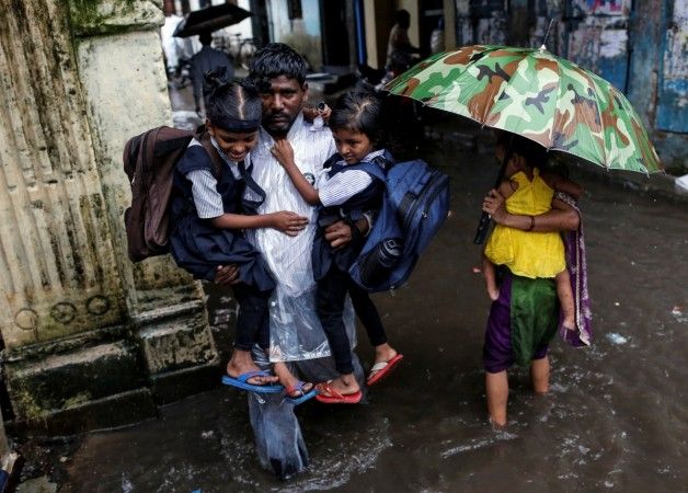 Heavy rains lash Telangana Photos