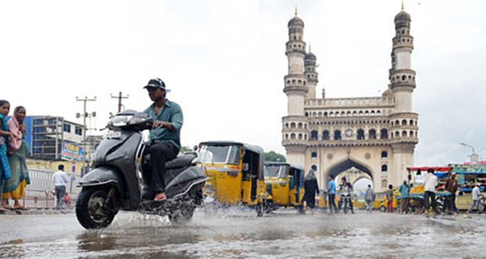 Heavy rains lash Telangana Photos