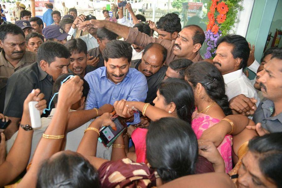 YS Jagan Takes Holy Dip in Krishna Pushkaralu PHOTOS