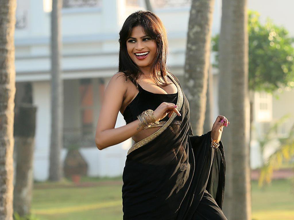 Christina Joy Latest Hot & Spicy Cleavage Show in Black Saree