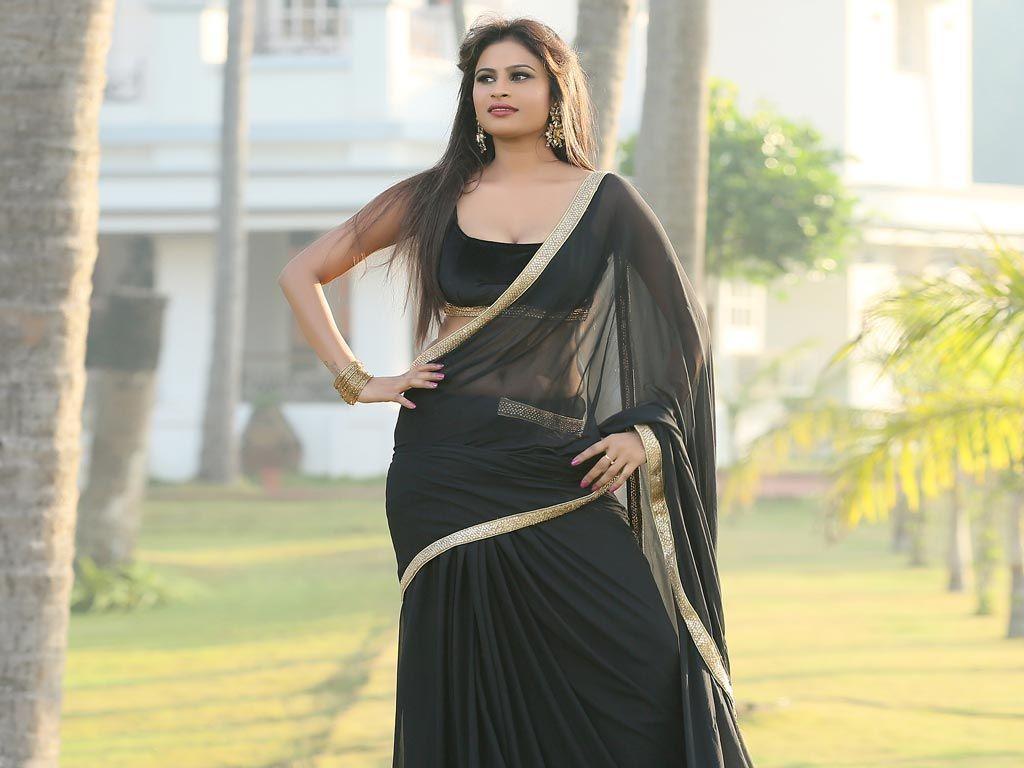 Christina Joy Latest Hot & Spicy Cleavage Show in Black Saree