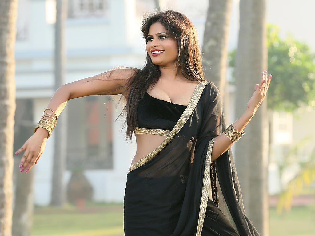 Christina Joy Latest Hot & Spicy Cleavage Show in Black Saree