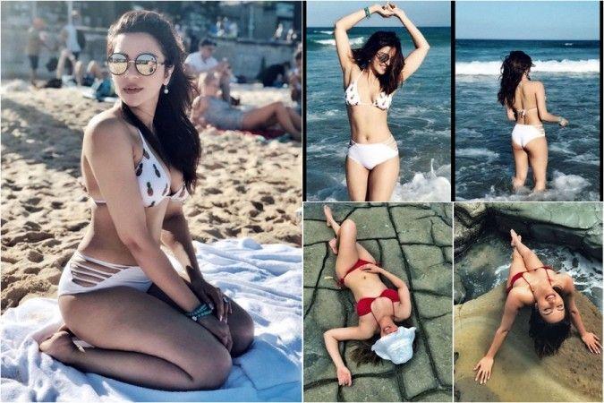 Indian Actress Shama Sikander looks extremely hot & sensuous in her Bikini Photos