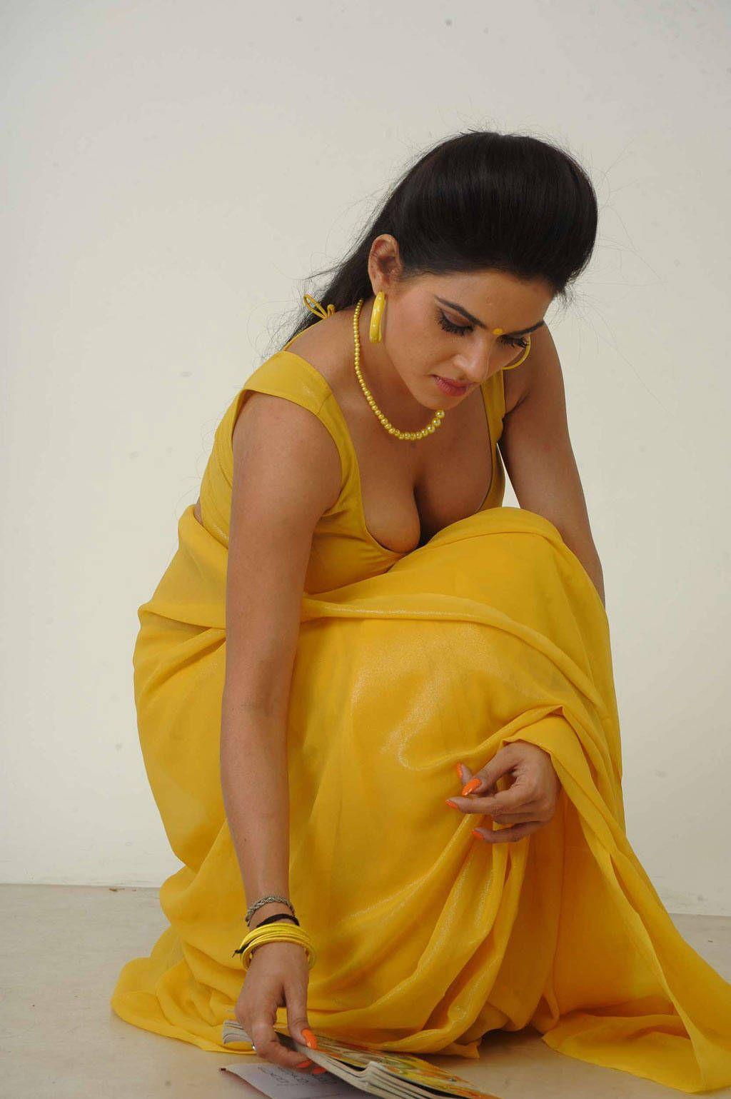 Kavya Singh Hot Photoshoot Stills in Yellow Saree