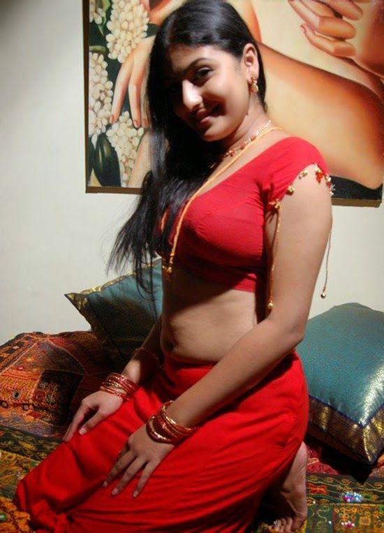 Monica Hot & Sexy Navel Show in Red Saree Stills