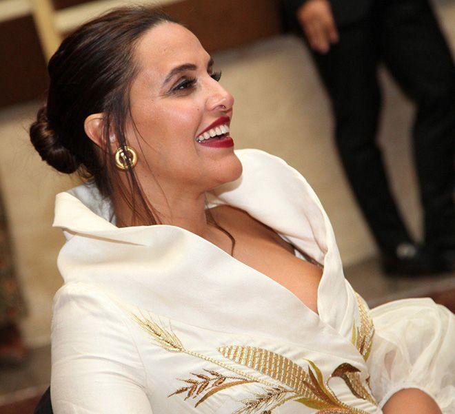 Neha Dhupia Exposing Her Huge Cleavage With Smile Photos