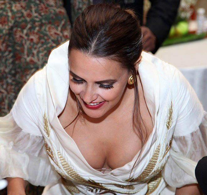 Neha Dhupia Exposing Her Huge Cleavage With Smile Photos