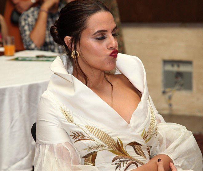 Neha Dhupia Exposing Her Huge Cleavage With Smile Photos