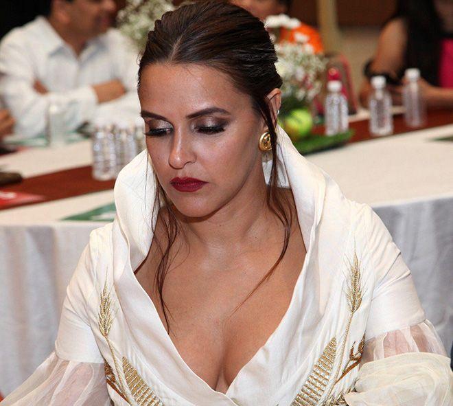 Neha Dhupia Exposing Her Huge Cleavage With Smile Photos