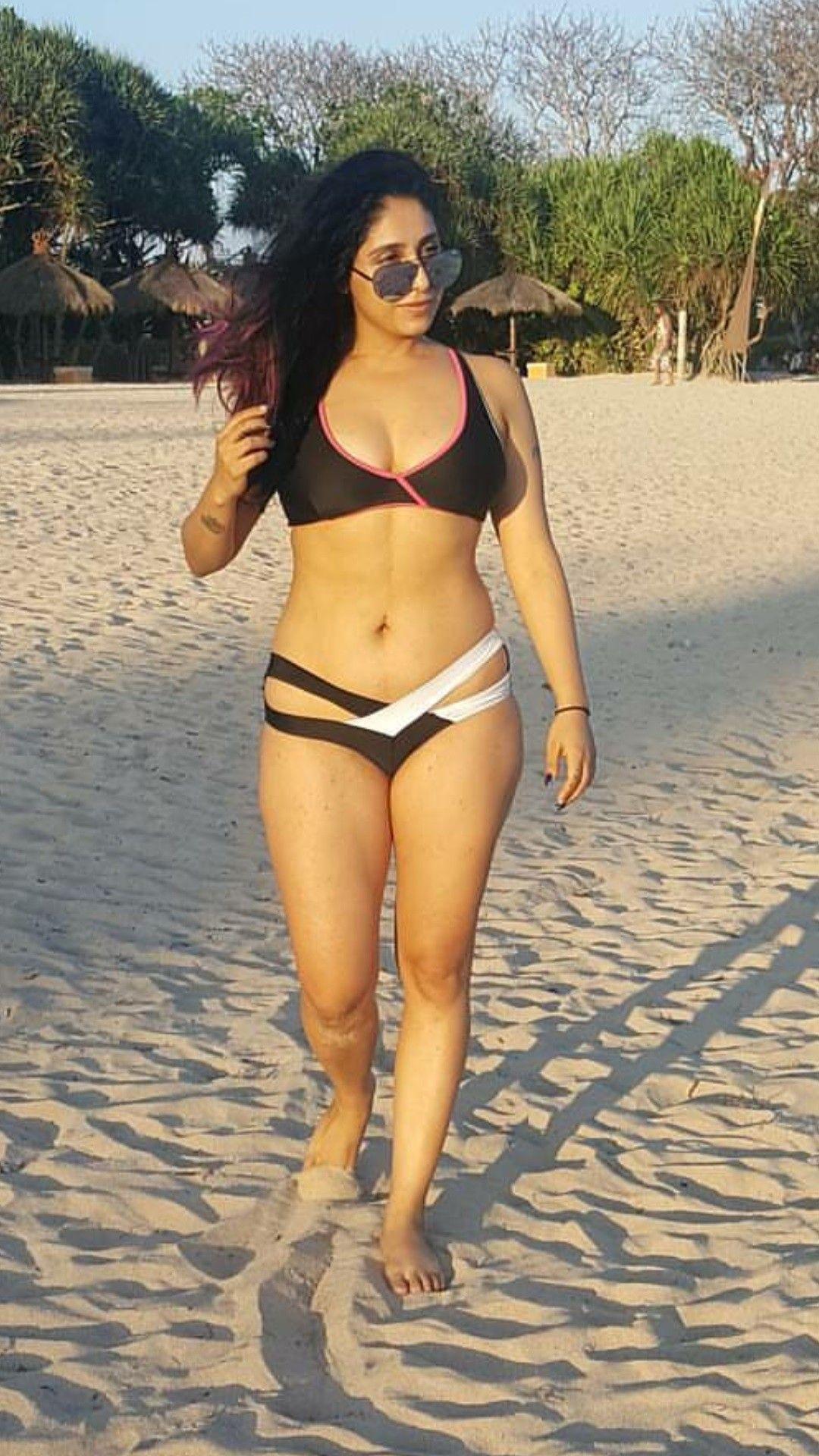 Singer Neha Bhasin Real Life Hot Bikini Photos.