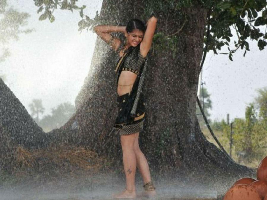 South Indian Beauties Sizzling in Rain Photos