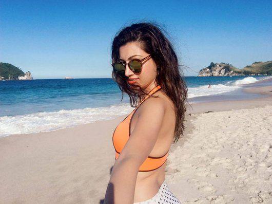 Telugu Item Girl Hamsa Nandini Enjoying in Beach Holiday Photos
