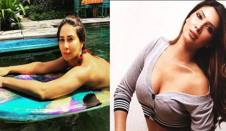 Unseen Bikini Pics of Kim Sharma Looking Striped Hot