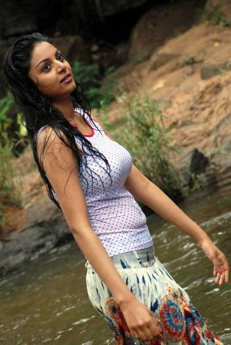 Actress Sanam Shetty Stills In White Top