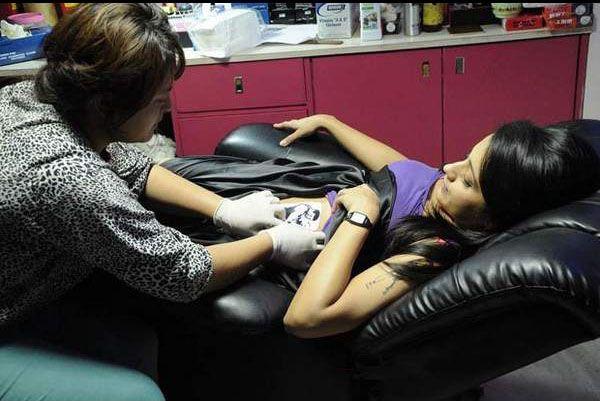 Trisha Gets Her Body Tattooed Pics