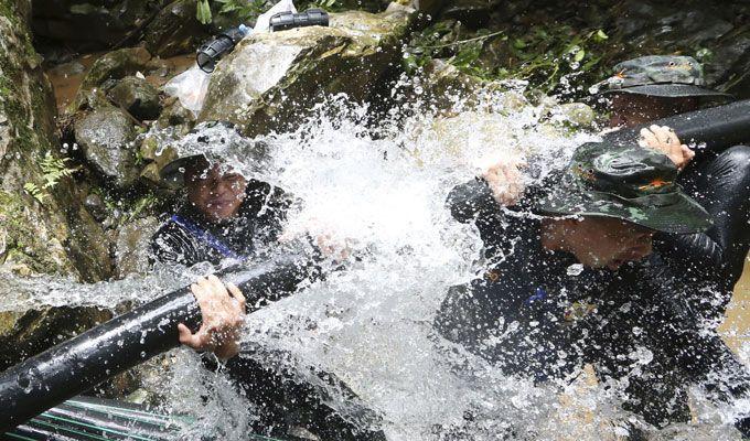 PHOTOS: Rescuers race to save soccer team trapped in Thai cave