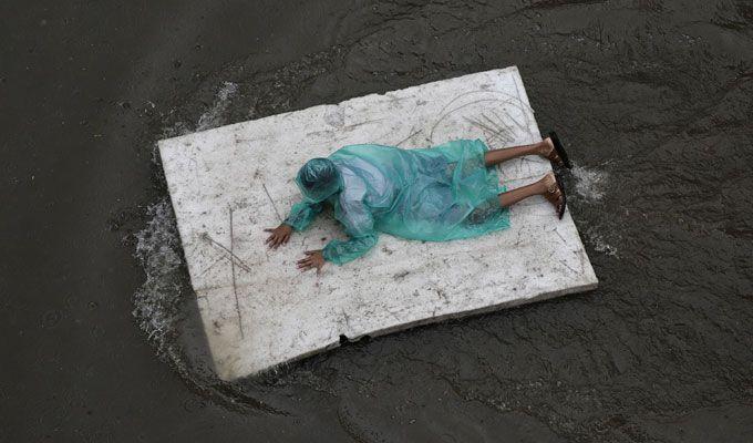 PHOTOS: Visuals of heavy rain & waterlogged streets from Mumbai's