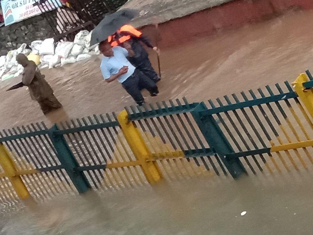 PHOTOS: Visuals of heavy rain & waterlogged streets from Mumbai's