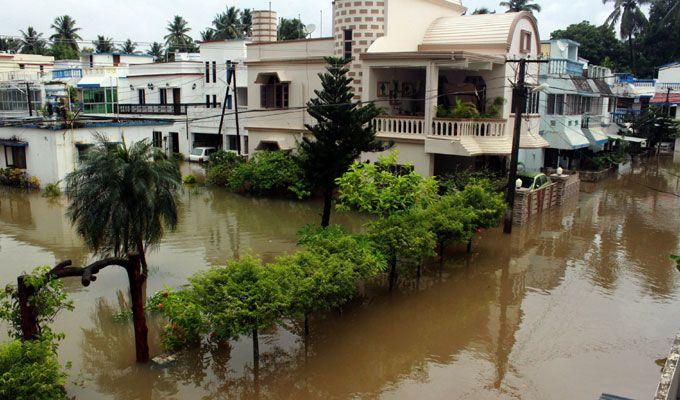 PHOTOS: Visuals of heavy rain & waterlogged streets from Odisha