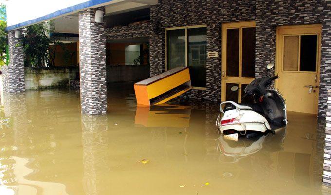 PHOTOS: Visuals of heavy rain & waterlogged streets from Odisha