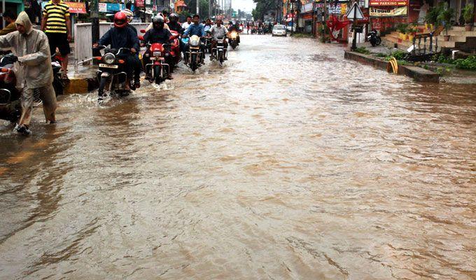 PHOTOS: Visuals of heavy rain & waterlogged streets from Odisha