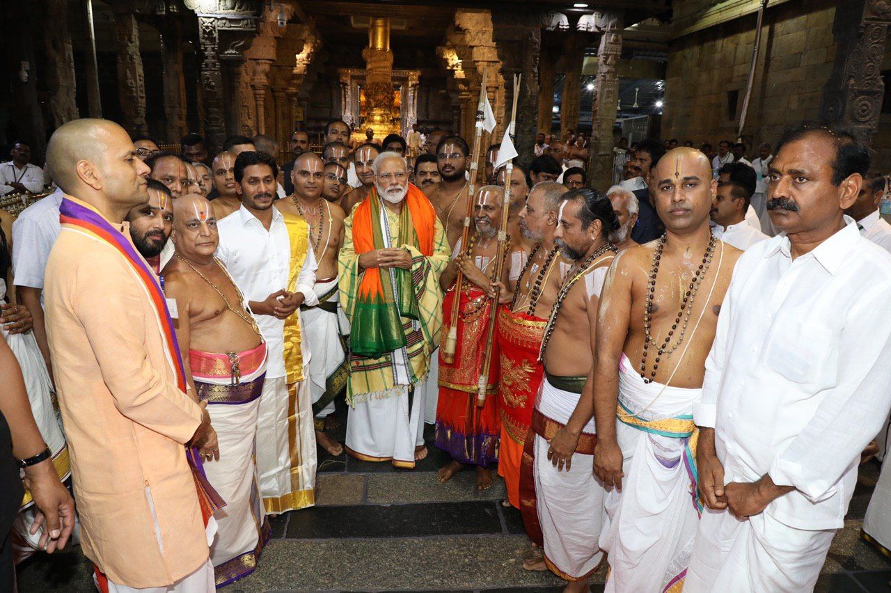 PM Narendramodi And CM Jagan Photos In Tirumala Tirupati