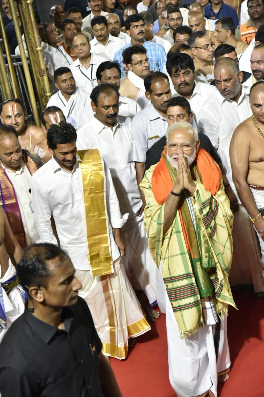 PM Narendramodi And CM Jagan Photos In Tirumala Tirupati