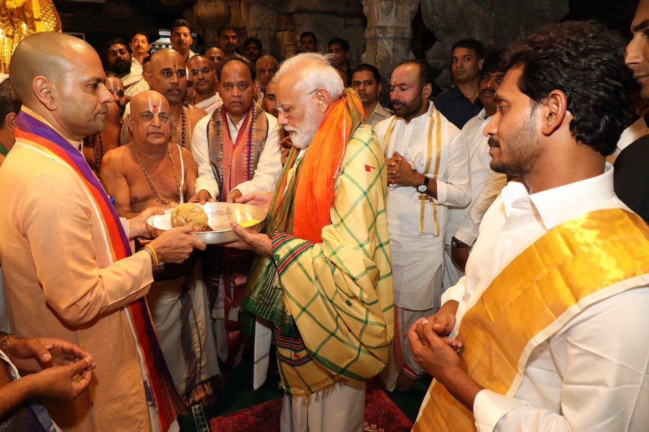 PM Narendramodi And CM Jagan Photos In Tirumala Tirupati