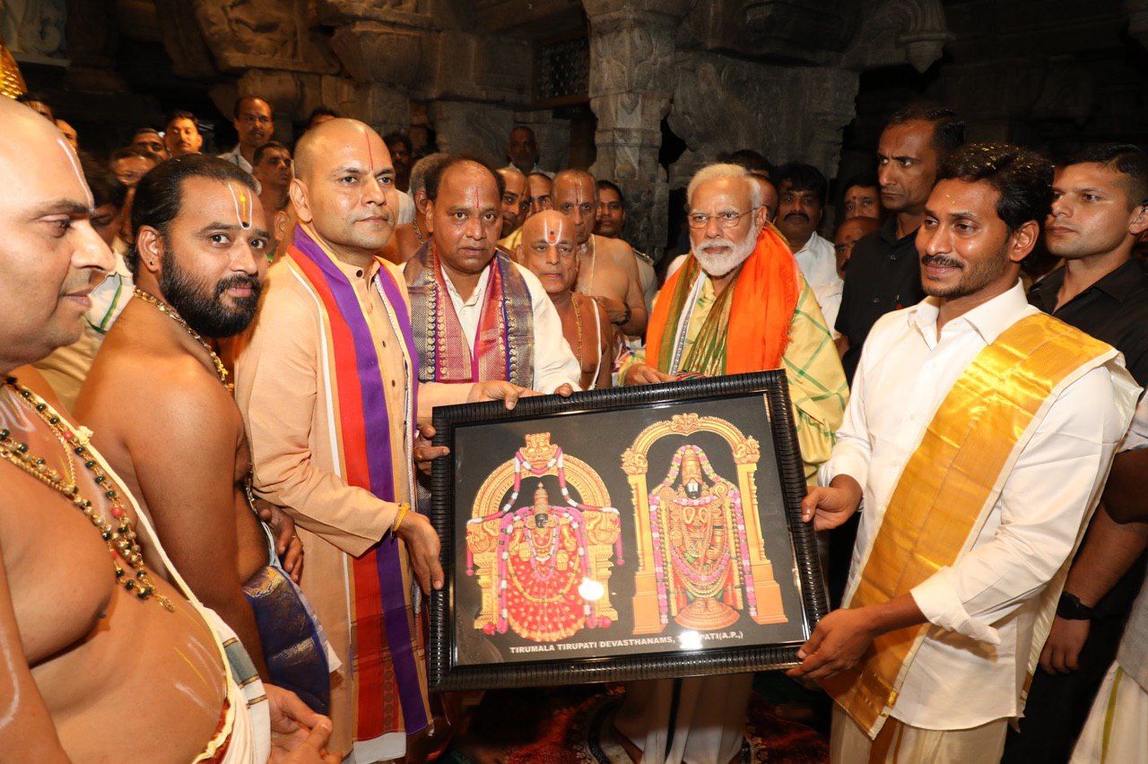 PM Narendramodi And CM Jagan Photos In Tirumala Tirupati