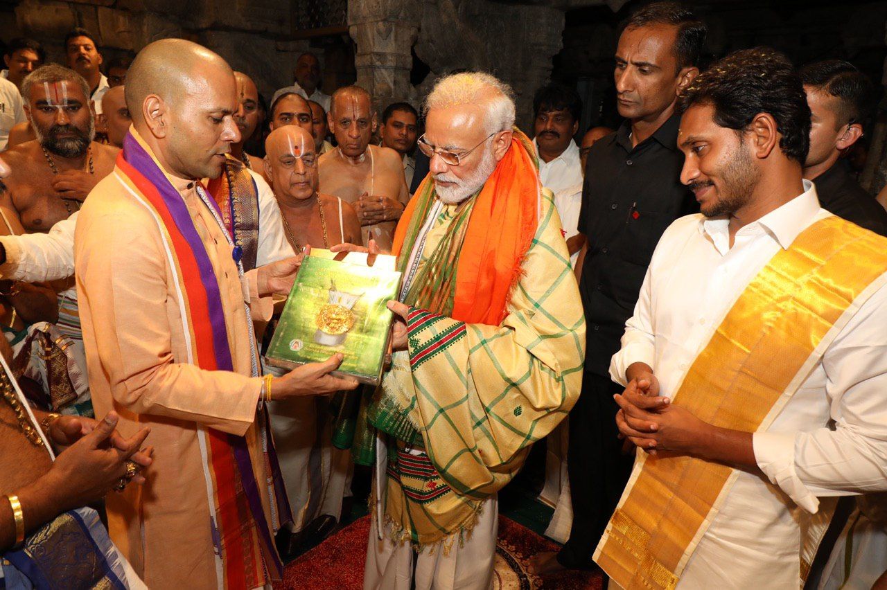 PM Narendramodi And CM Jagan Photos In Tirumala Tirupati